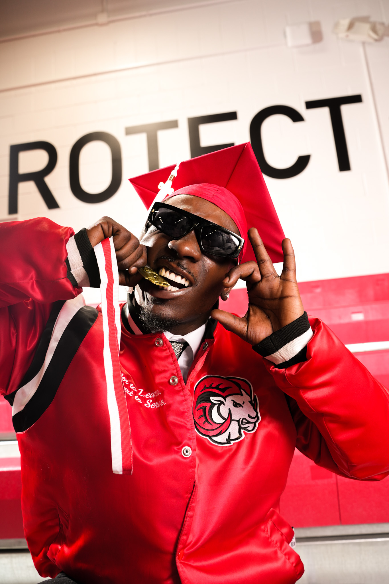 Athlete celebrating in a red uniform